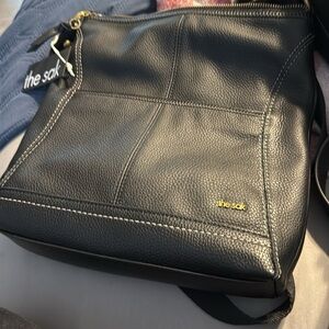 The Sak Black Leather Messenger Crossbody with Gold Accents